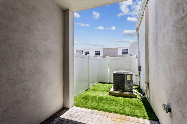 view of yard with central AC unit