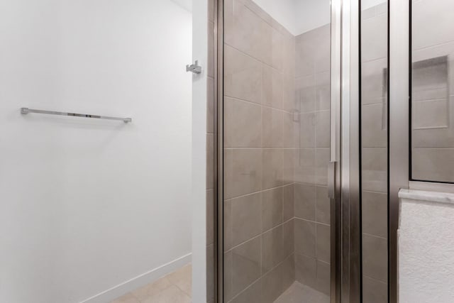 bathroom featuring tile patterned floors and walk in shower