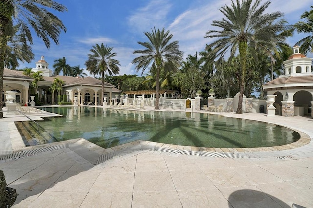 view of home's community featuring a pool