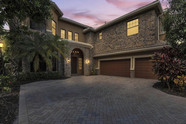 view of front of property featuring a garage