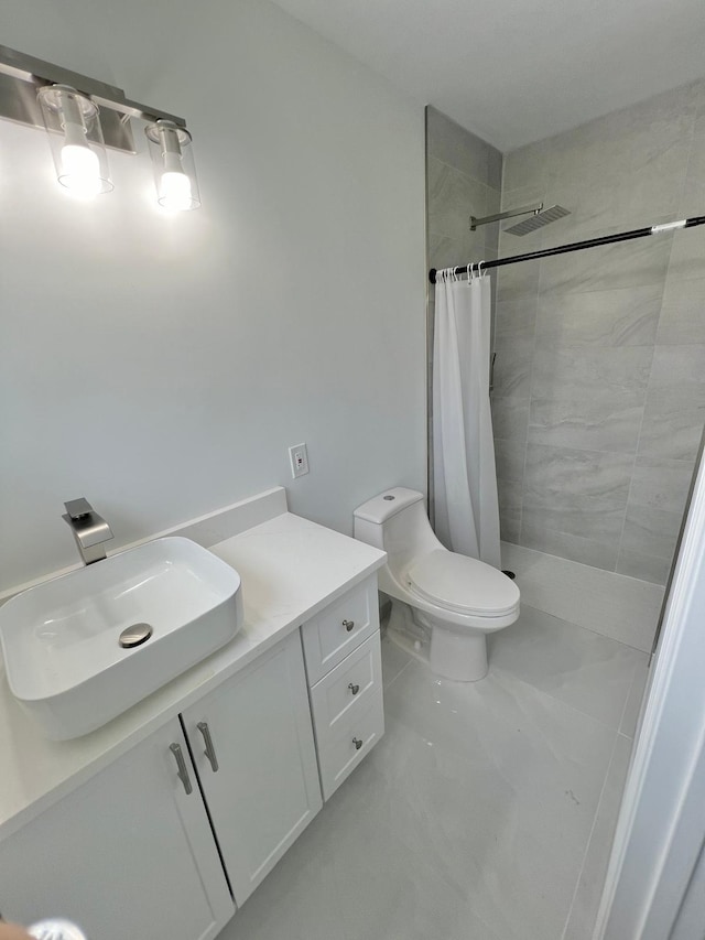 bathroom featuring walk in shower, vanity, and toilet