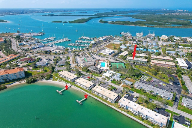 birds eye view of property with a water view