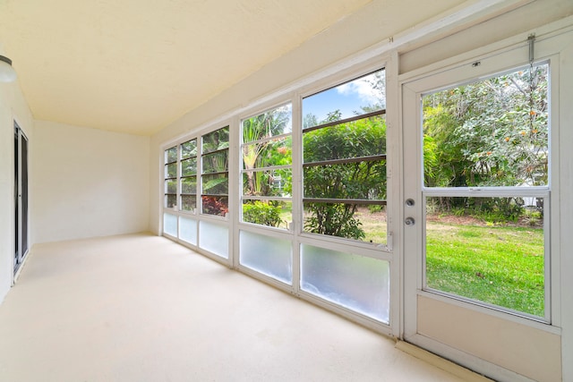 unfurnished sunroom with a healthy amount of sunlight