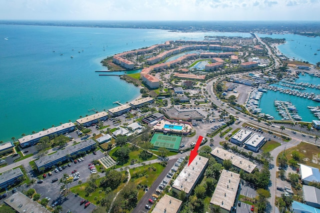 birds eye view of property featuring a water view