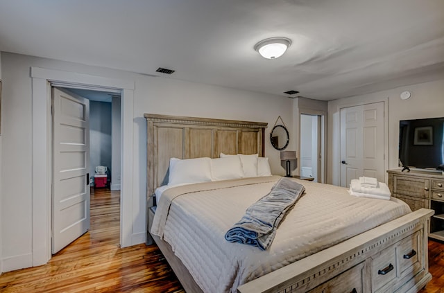 bedroom featuring hardwood / wood-style floors