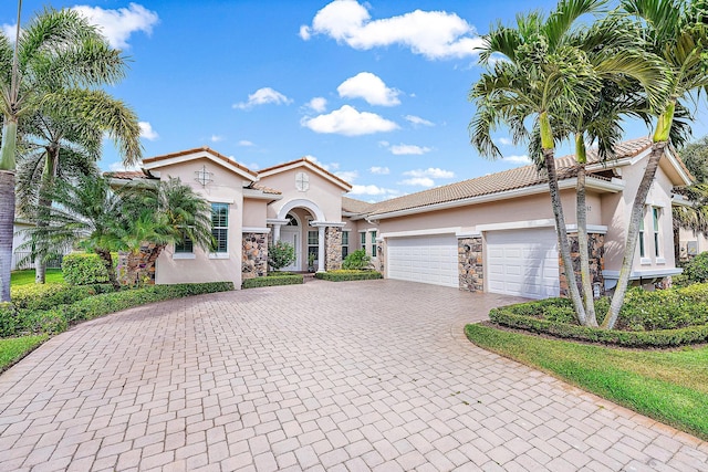 view of front of home with a garage