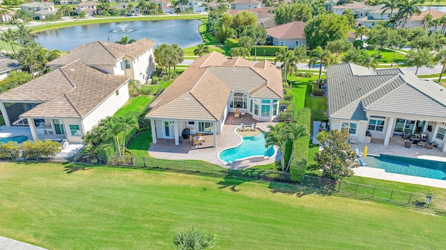 drone / aerial view with a water view