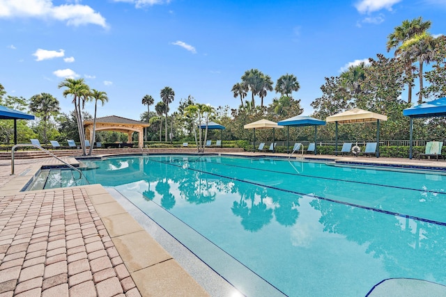 view of swimming pool featuring a patio area