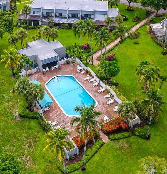 view of swimming pool with a patio