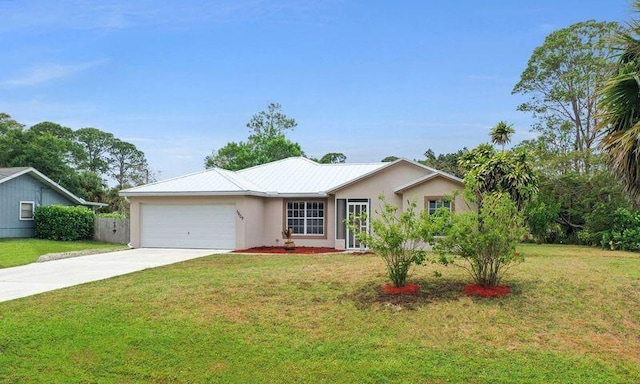 single story home with a garage, driveway, a front lawn, and stucco siding