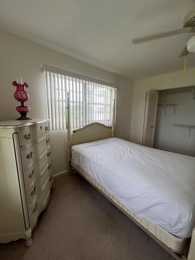 bedroom featuring carpet flooring and ceiling fan