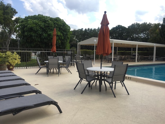 view of patio / terrace with a community pool