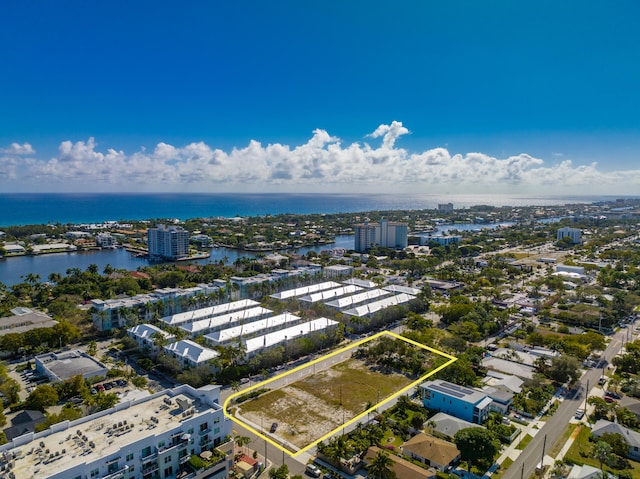 drone / aerial view featuring a water view