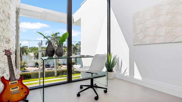 office featuring plenty of natural light and tile floors