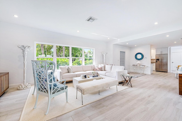 living room featuring light hardwood / wood-style flooring