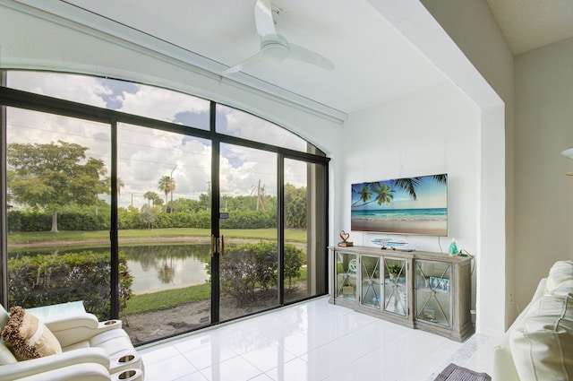 sunroom / solarium with ceiling fan and a wealth of natural light