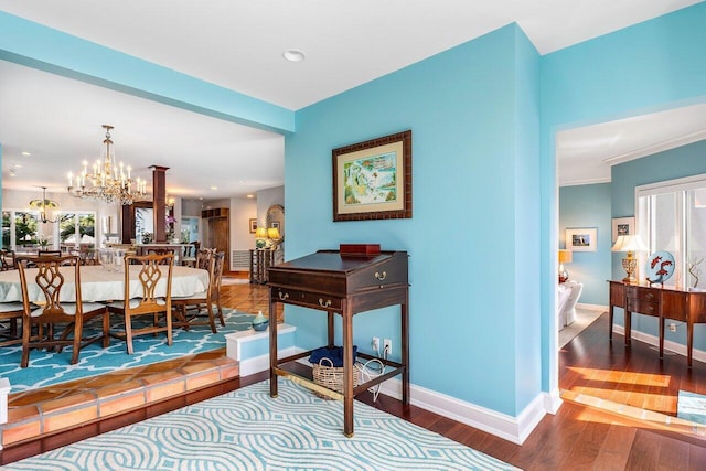 interior space featuring a notable chandelier and hardwood / wood-style floors