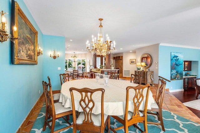 dining space featuring a notable chandelier, crown molding, and dark hardwood / wood-style floors