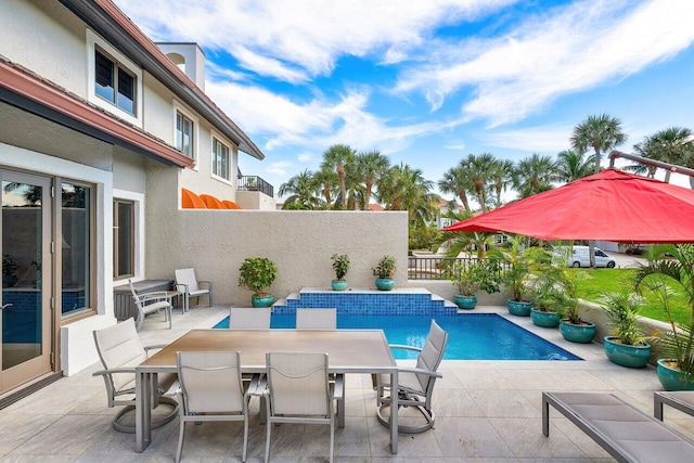 view of pool with a patio area