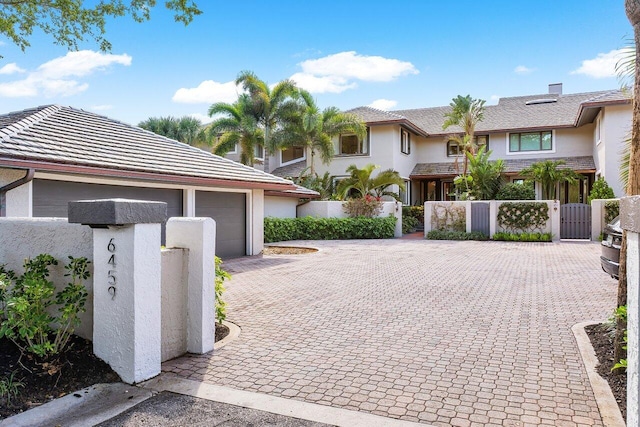 view of front of property with a garage