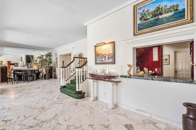 hall featuring ornamental molding and tile flooring