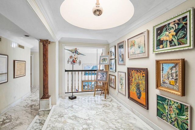 corridor featuring tile flooring, crown molding, ornate columns, and a tray ceiling