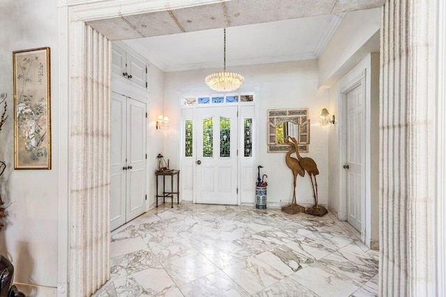 foyer featuring a notable chandelier and light tile flooring