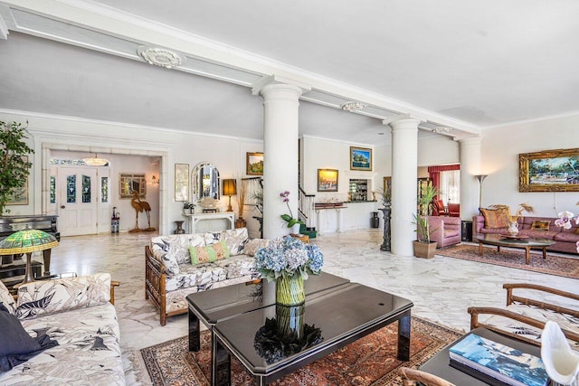 living room featuring decorative columns, tile floors, and crown molding