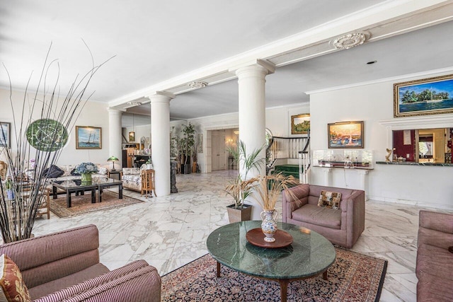 tiled living room featuring ornamental molding and ornate columns