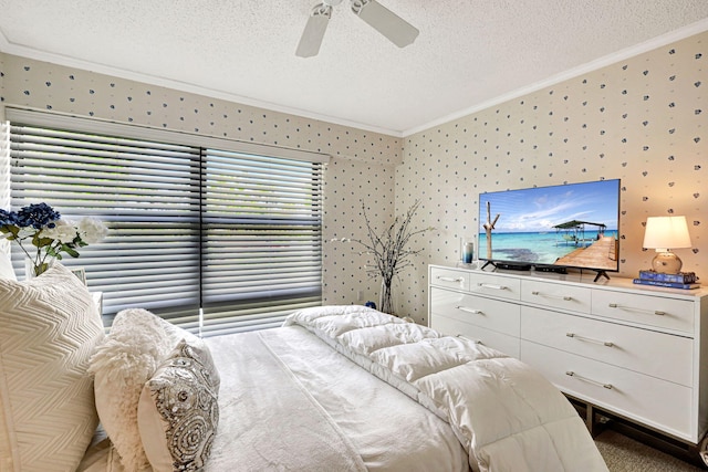 bedroom with a textured ceiling, ceiling fan, and crown molding