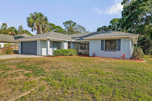 ranch-style house with a garage and a front yard