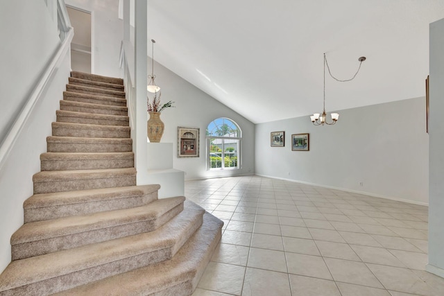 stairway featuring high vaulted ceiling, tile floors, and an inviting chandelier