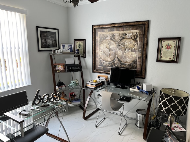 office with marble finish floor, crown molding, and a ceiling fan