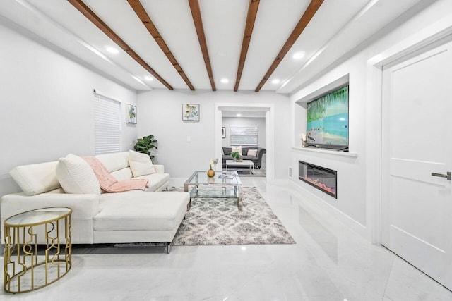 living room featuring beamed ceiling