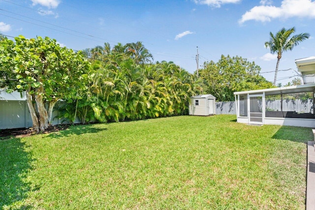 view of yard featuring a storage unit