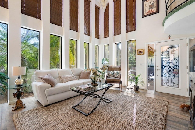 sunroom / solarium featuring a healthy amount of sunlight