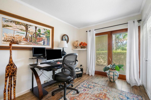 office featuring ornamental molding, wood-type flooring, and a textured ceiling