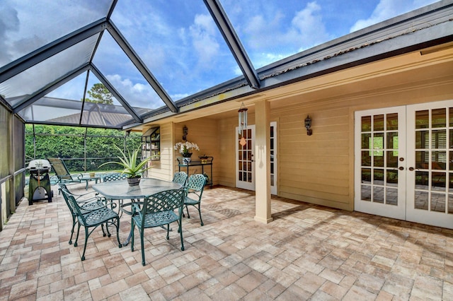 sunroom featuring french doors