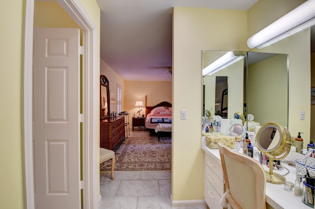 bathroom featuring vanity and tile flooring