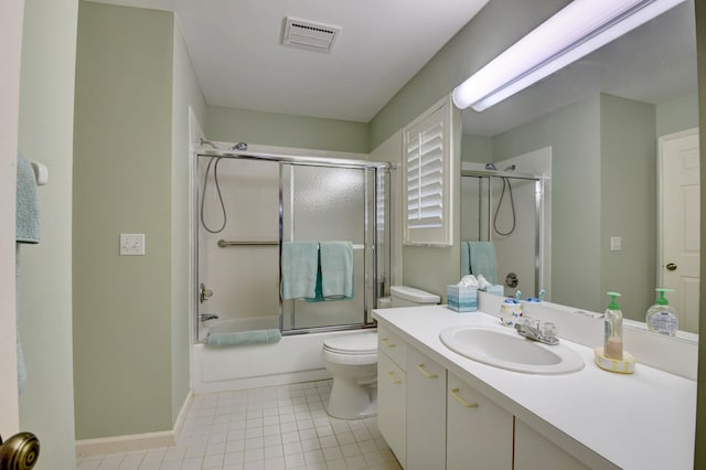 full bathroom featuring shower / bath combination with glass door, vanity, toilet, and tile flooring