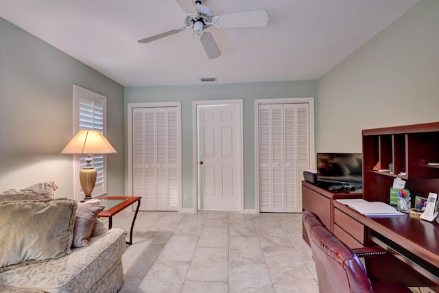 office area featuring ceiling fan and light tile floors