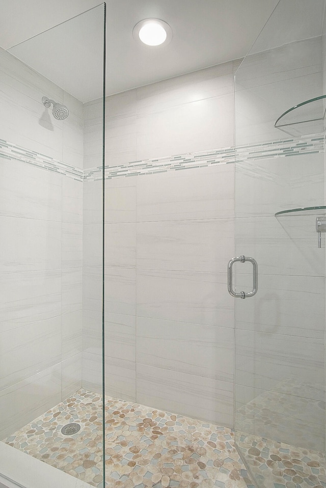 bathroom with an enclosed shower