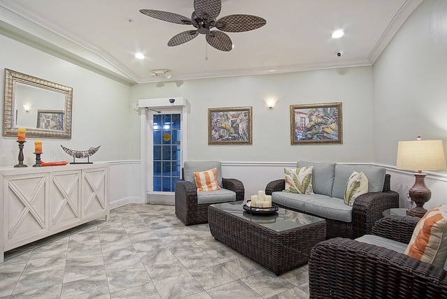 living room featuring ceiling fan, crown molding, and vaulted ceiling