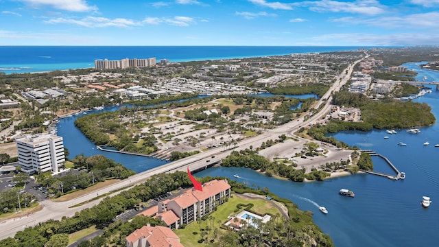 drone / aerial view with a water view