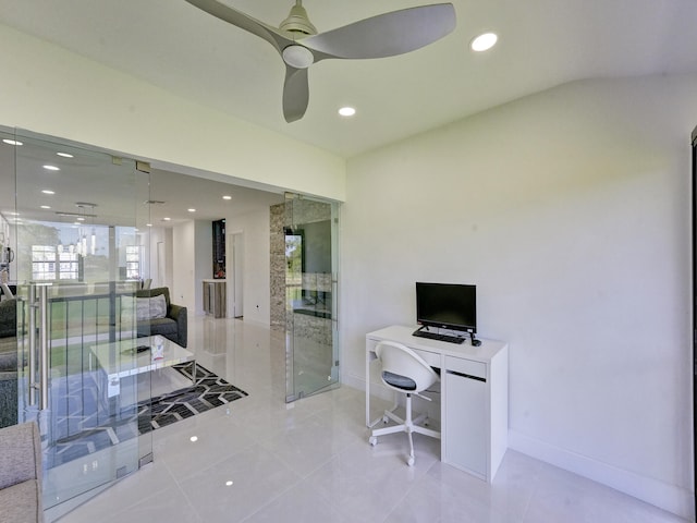 office space with ceiling fan and light tile patterned floors