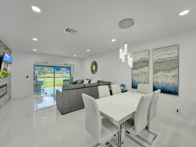 dining space with a fireplace