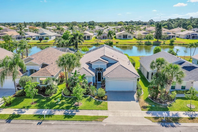 drone / aerial view with a water view