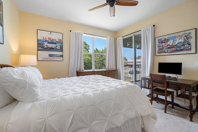 carpeted bedroom featuring ceiling fan and access to exterior