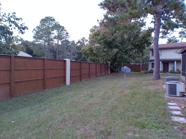 view of yard featuring central AC