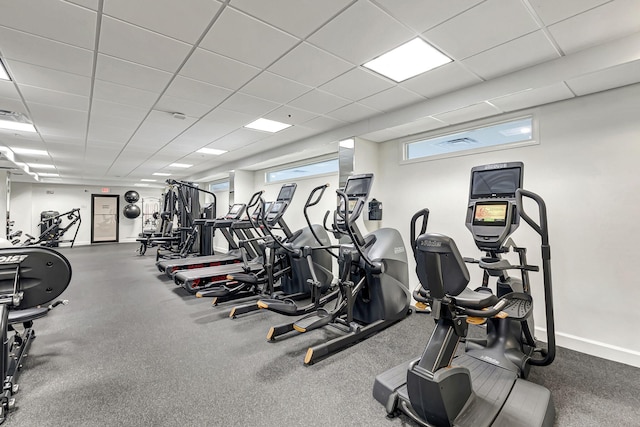 workout area with a drop ceiling